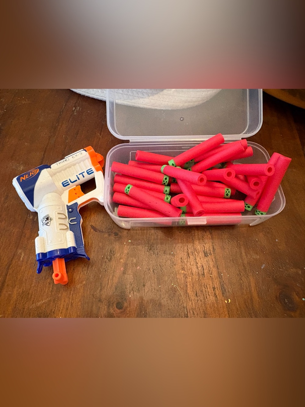 Nerf Elite Triad EX-3 blaster with red foam darts